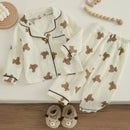 Conjunto Pijama Bear infantil com camisa de manga longa e calça, feito em algodão e linho, ideal para meninos e meninas de 1 a 6 anos.