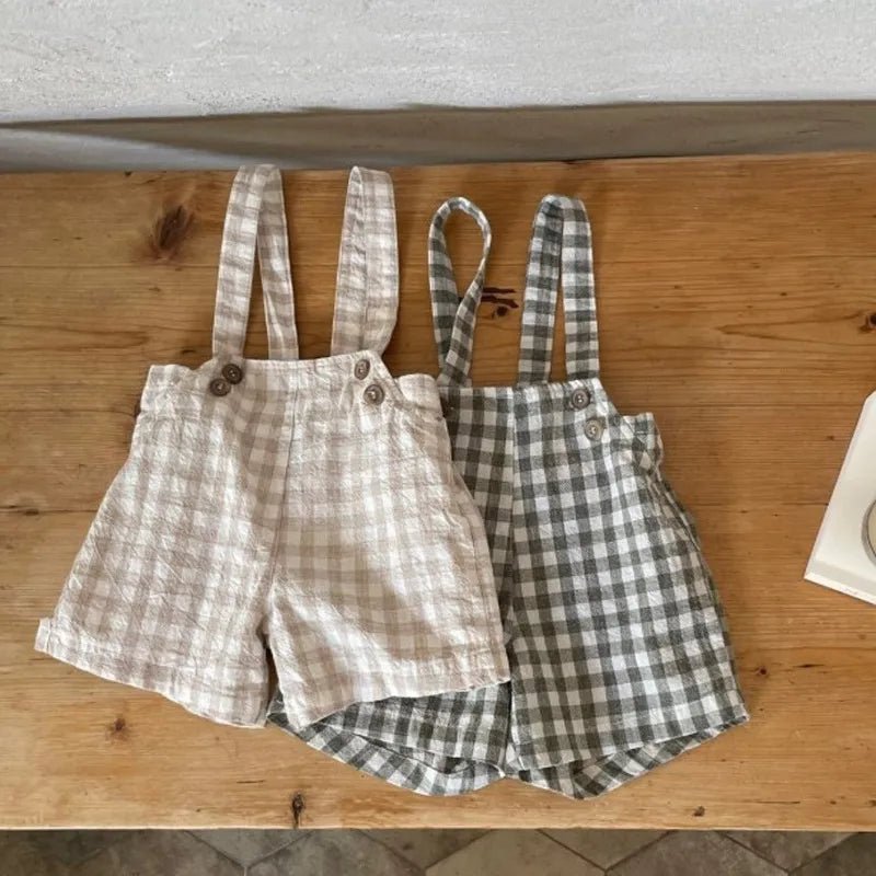 Jardineira Baby Xadrez – Boutique Infantil Les Enfants