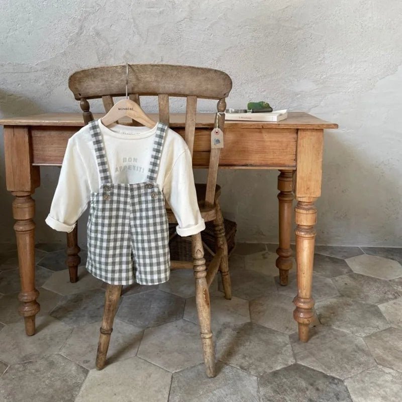 Jardineira Baby Xadrez – Boutique Infantil Les Enfants