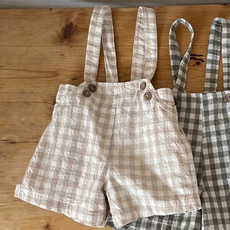 Jardineira Baby Xadrez – Boutique Infantil Les Enfants